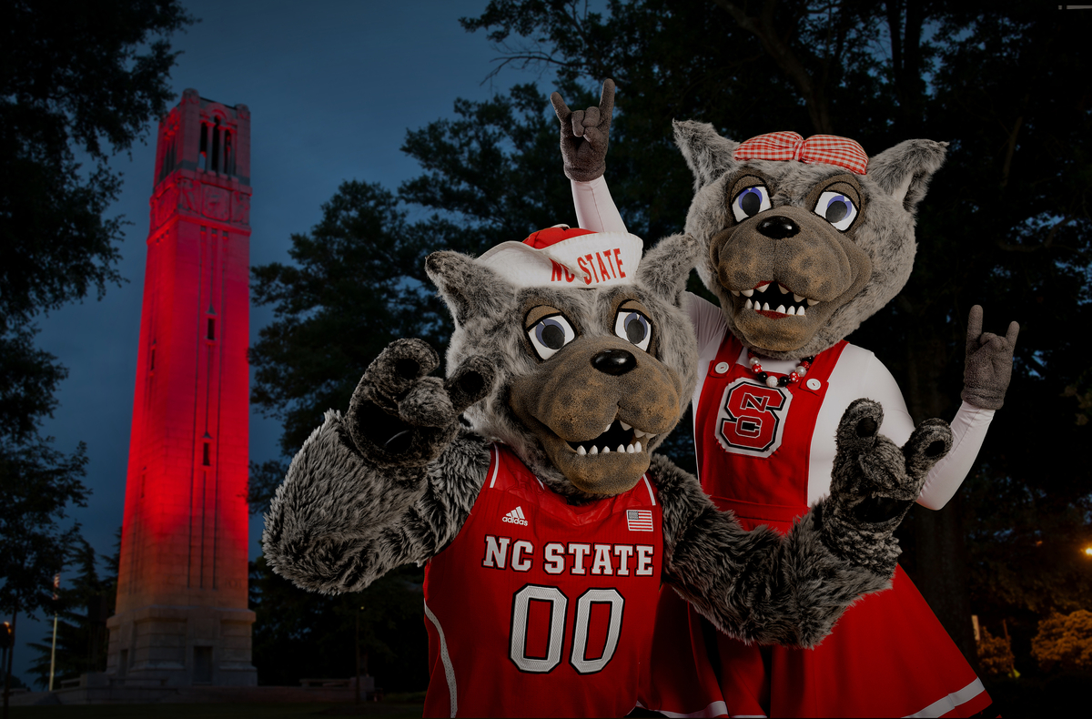 Mr. and Ms. Wuf in front of the red belltower.