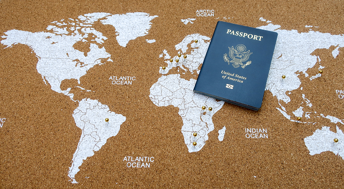 US passport on global map