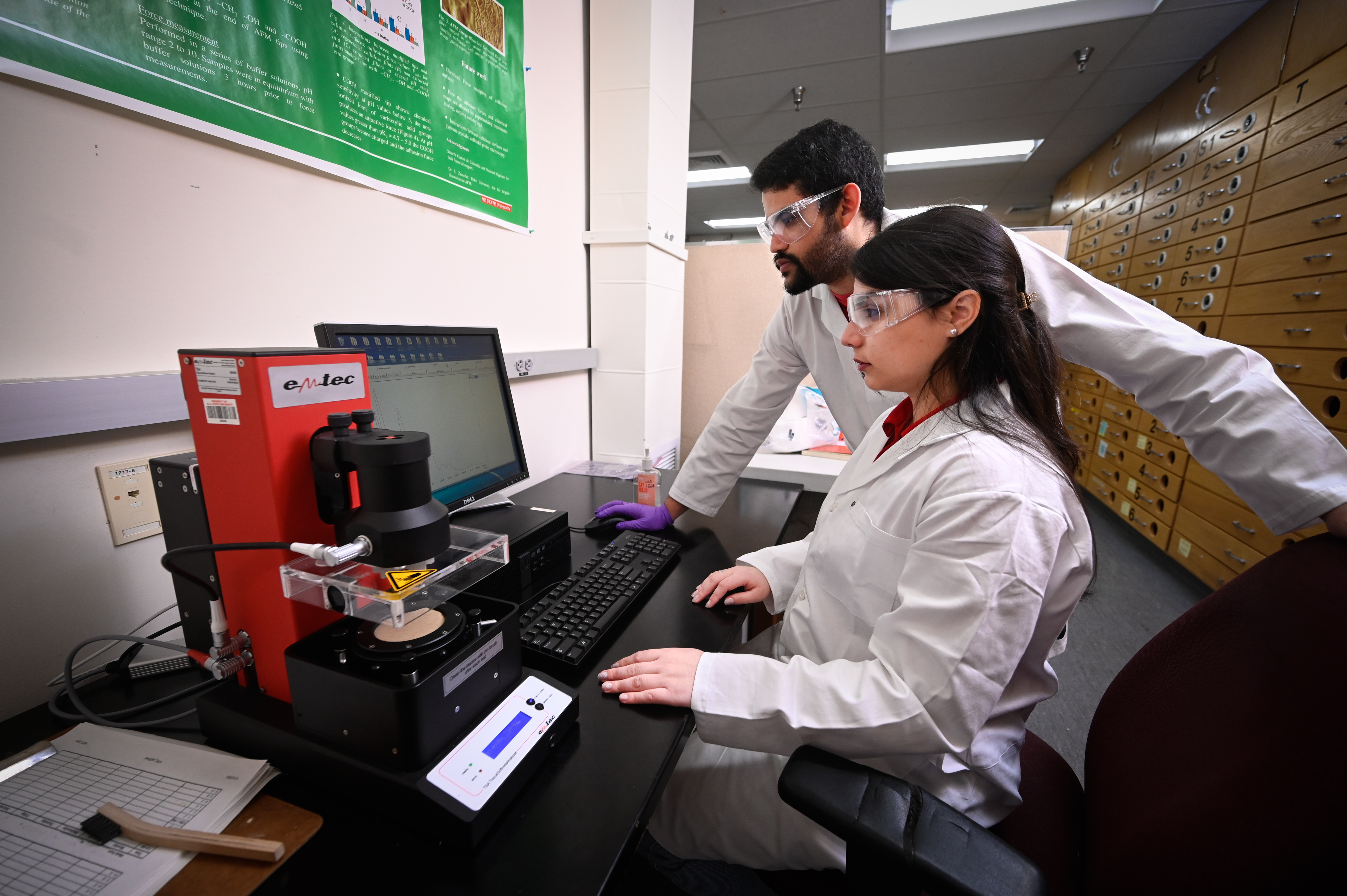 Graduate students work in the Pulp and paper lab; in the department of Forest Biomaterials (CNR). The students are working in the Sustainable and Alternative Fibers Initiative. The Sustainable and Alternative Fibers Initiative (SAFI) is the major global university-industry partnership effort focused on researching, developing, and utilizing alternative fibers to manufacture a myriad of sustainable products. Photo by Marc Hall